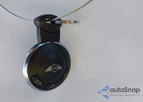 2010 Mini Cooper z USA, uszkodzony, nr VIN WMWMF3C52ATU79415